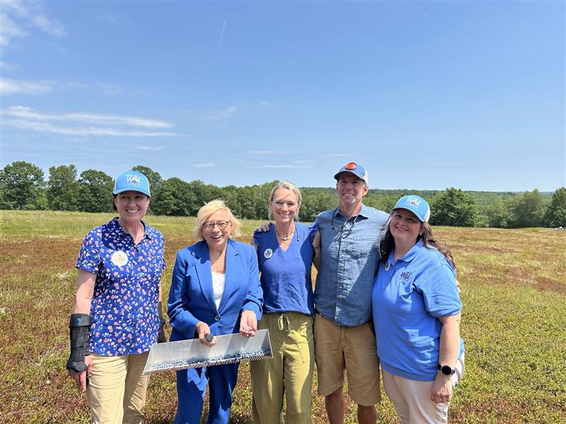 Governor Mills and other state leaders at Fields Fields Blueberries.