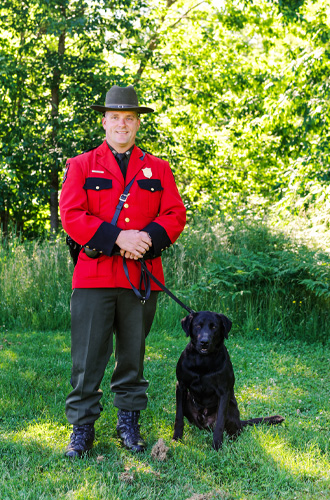 Warden Alan Curtis and K9 Grizz