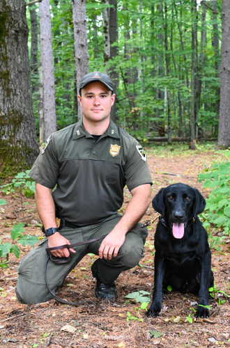 Warden Tyler Harhart and K9 Tex