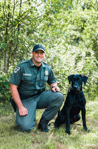 Warden Preston Pomerleau and K9 Gordon